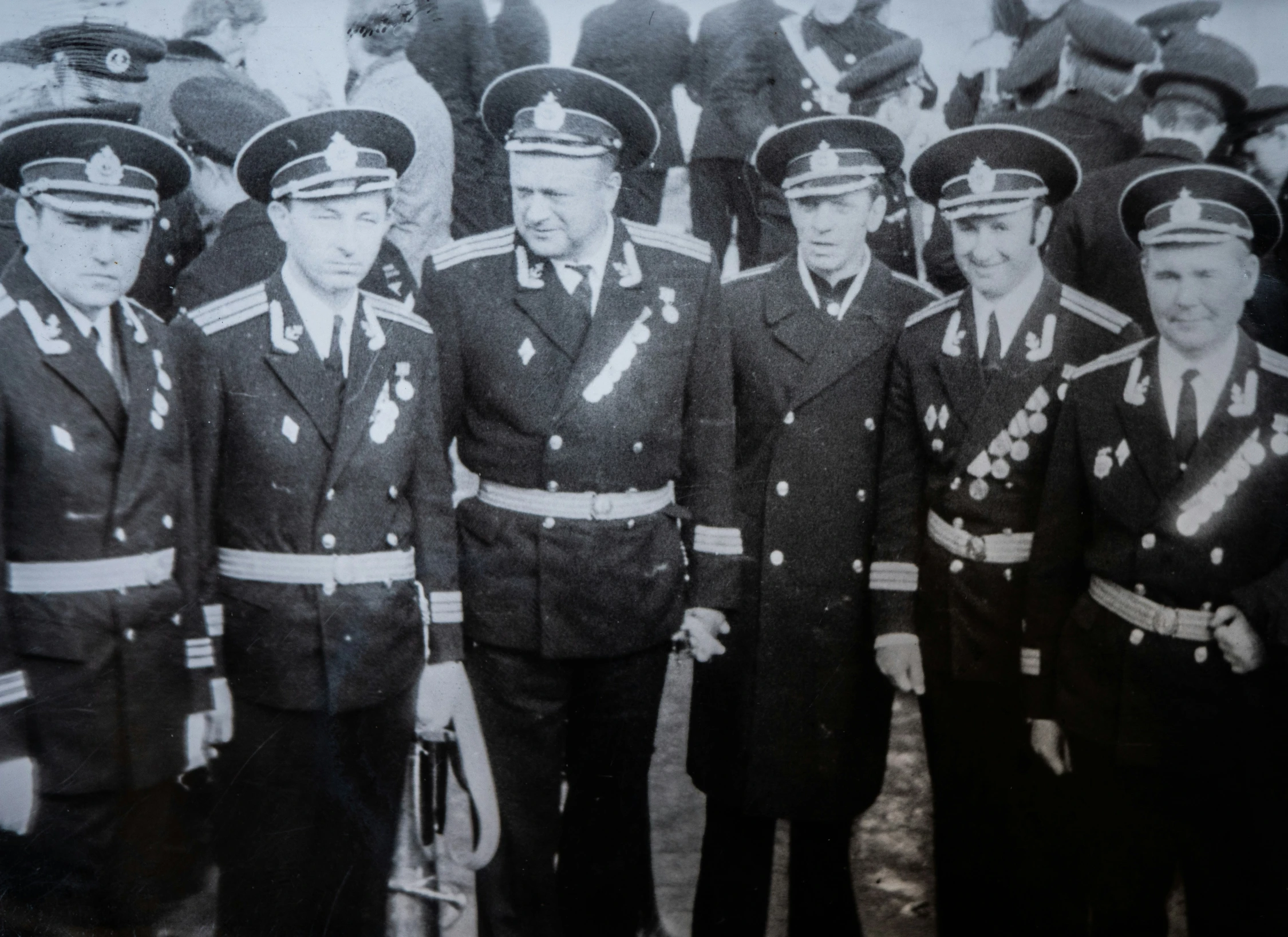 a group of men in uniform are posing for a picture