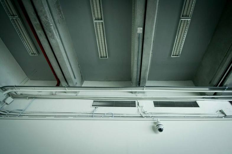 an air conditioner hanging from the ceiling in a room