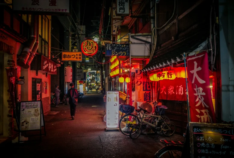 a dark alley in an asian city at night