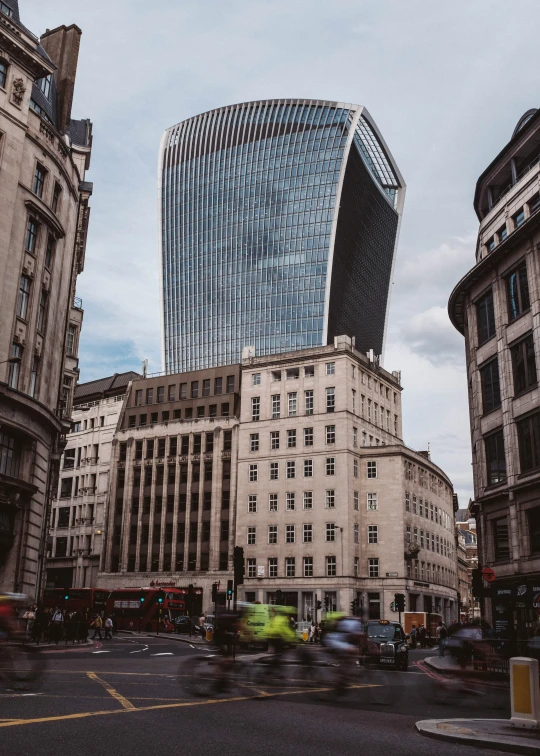 a big skyscr towering over a bunch of buildings