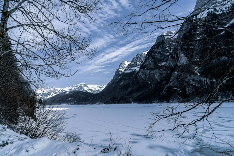 a couple of mountains that are covered in snow