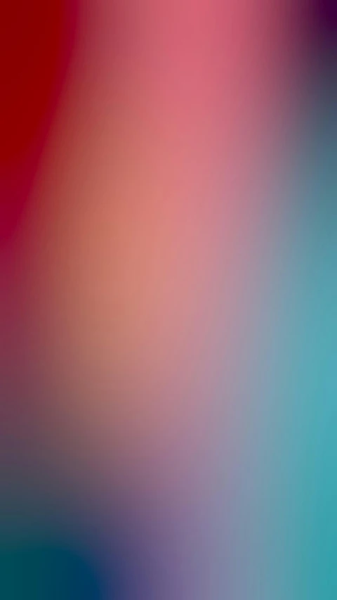 a blurry abstract background is shown with some colored highlights