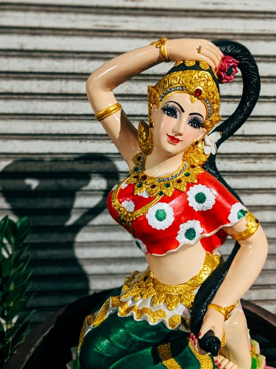 an indian figurine wearing a  on display
