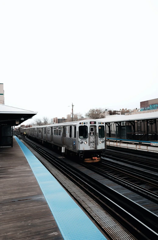 a passenger train going down the tracks