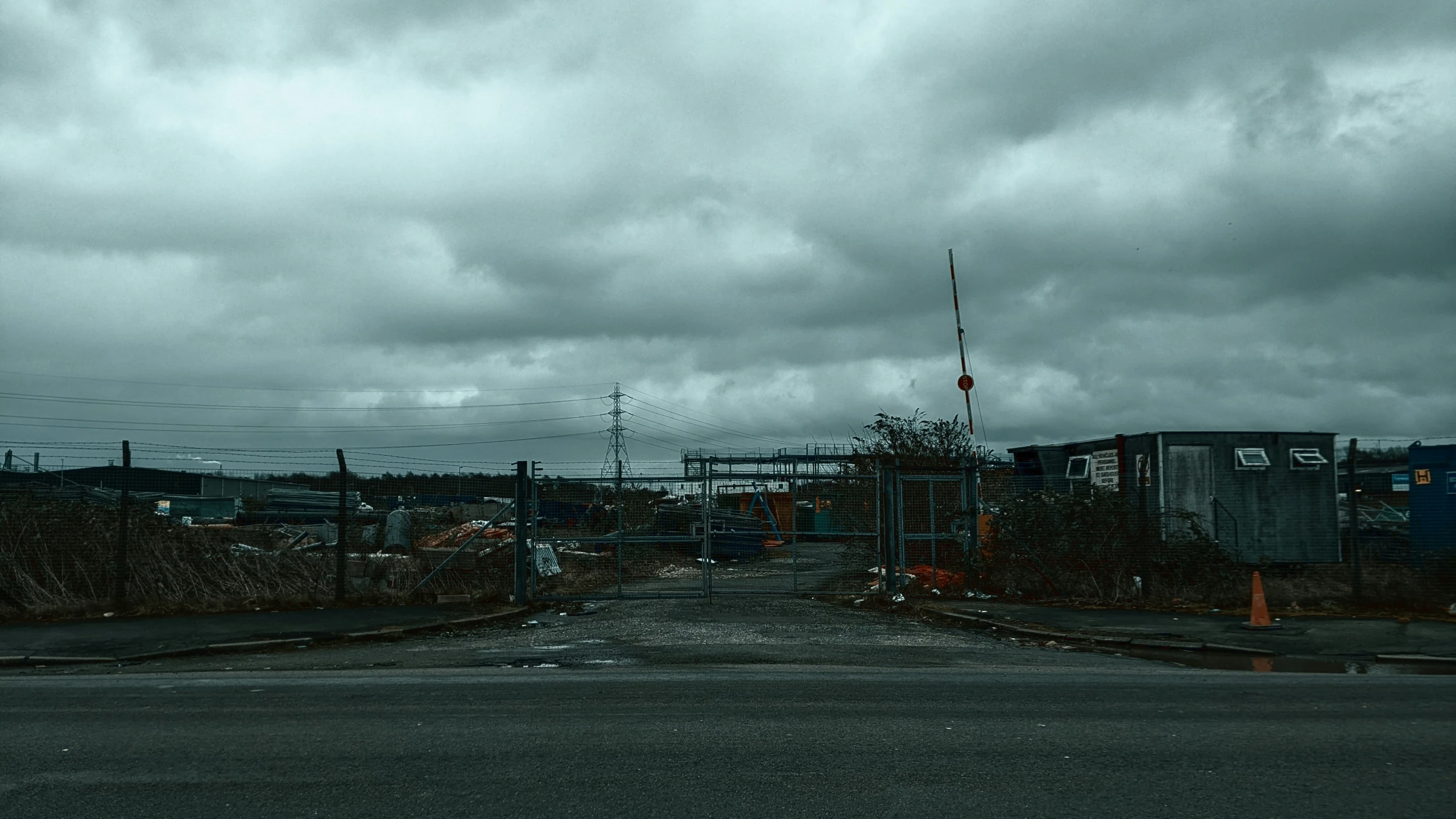 the clouds hang low above a yard area