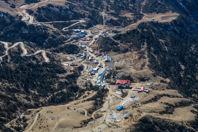 an aerial view of an area in the mountains