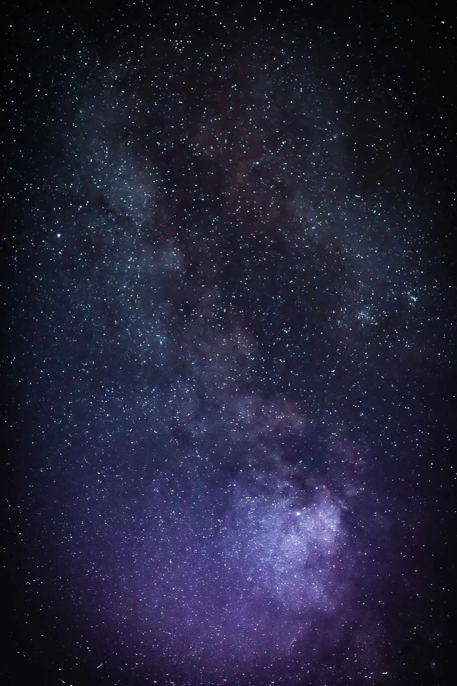 a view of the night sky with lots of stars