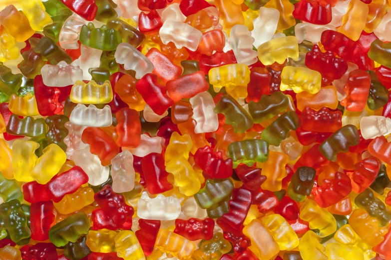 a mixture of jelly bears and candy canes