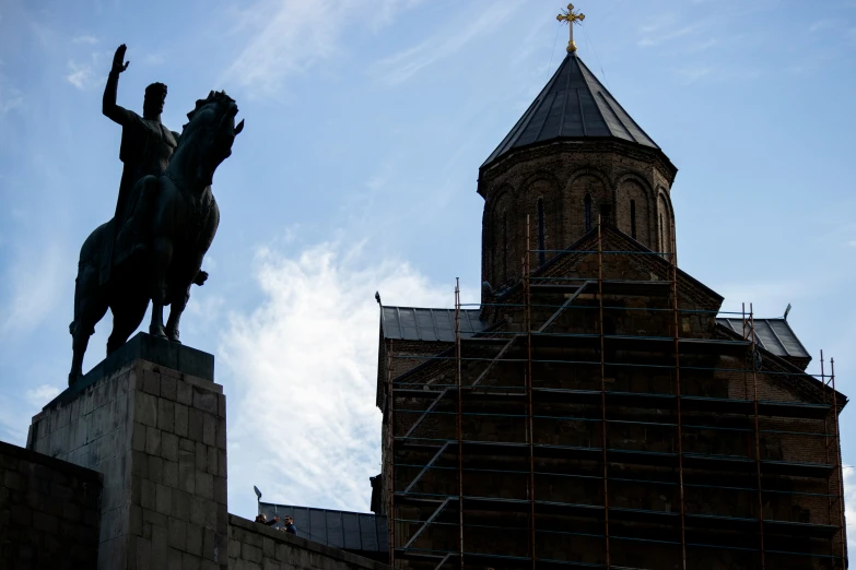 there is an image of a statue on a horse