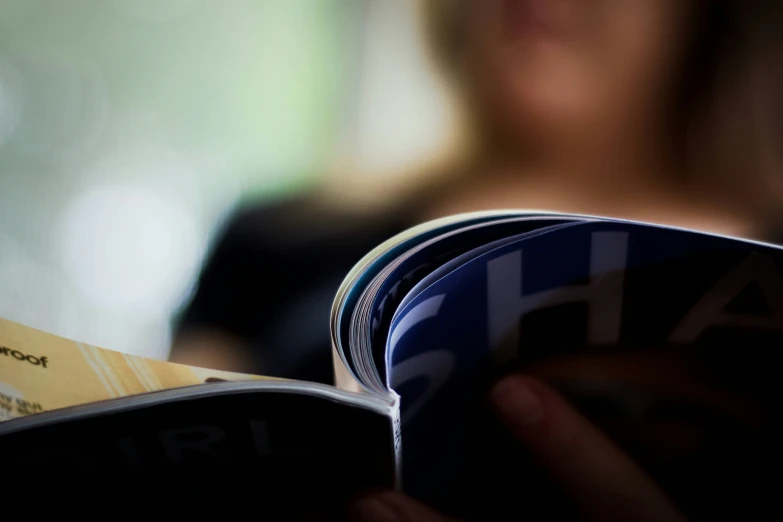 close up view of a cd that has been pulled out of a folder