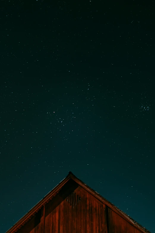 some stars over a building at night