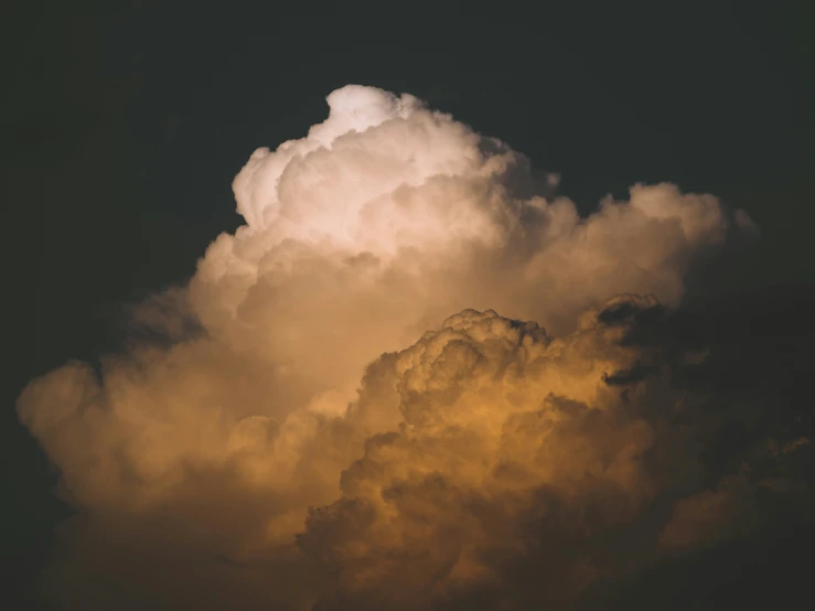 a cloud that is floating in the sky