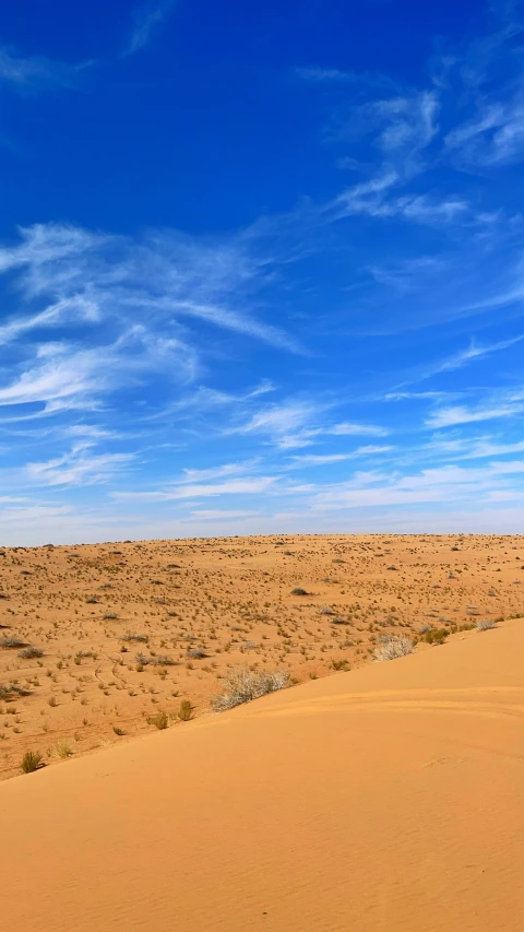 the landscape is very barren, with little patches of blue sky