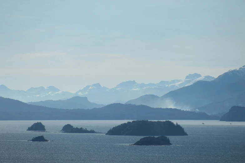 a large body of water surrounded by mountains