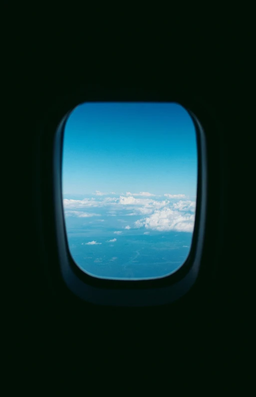 the view out of an airplane window as it flies