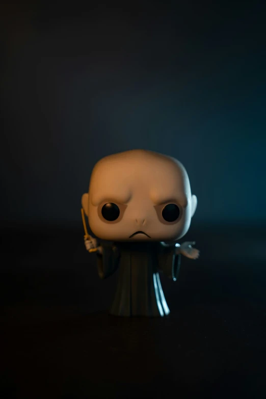 a white skull wearing a cane standing in front of a black background
