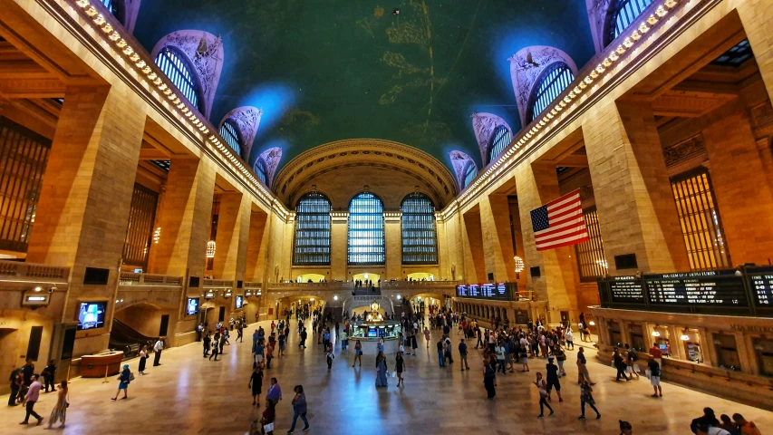 many people walk around inside the grand central building