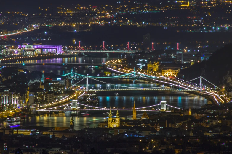 a large bridge that is above a city