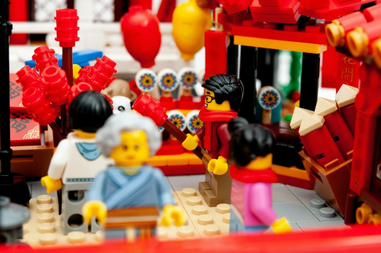 lego people gather in the center of a table