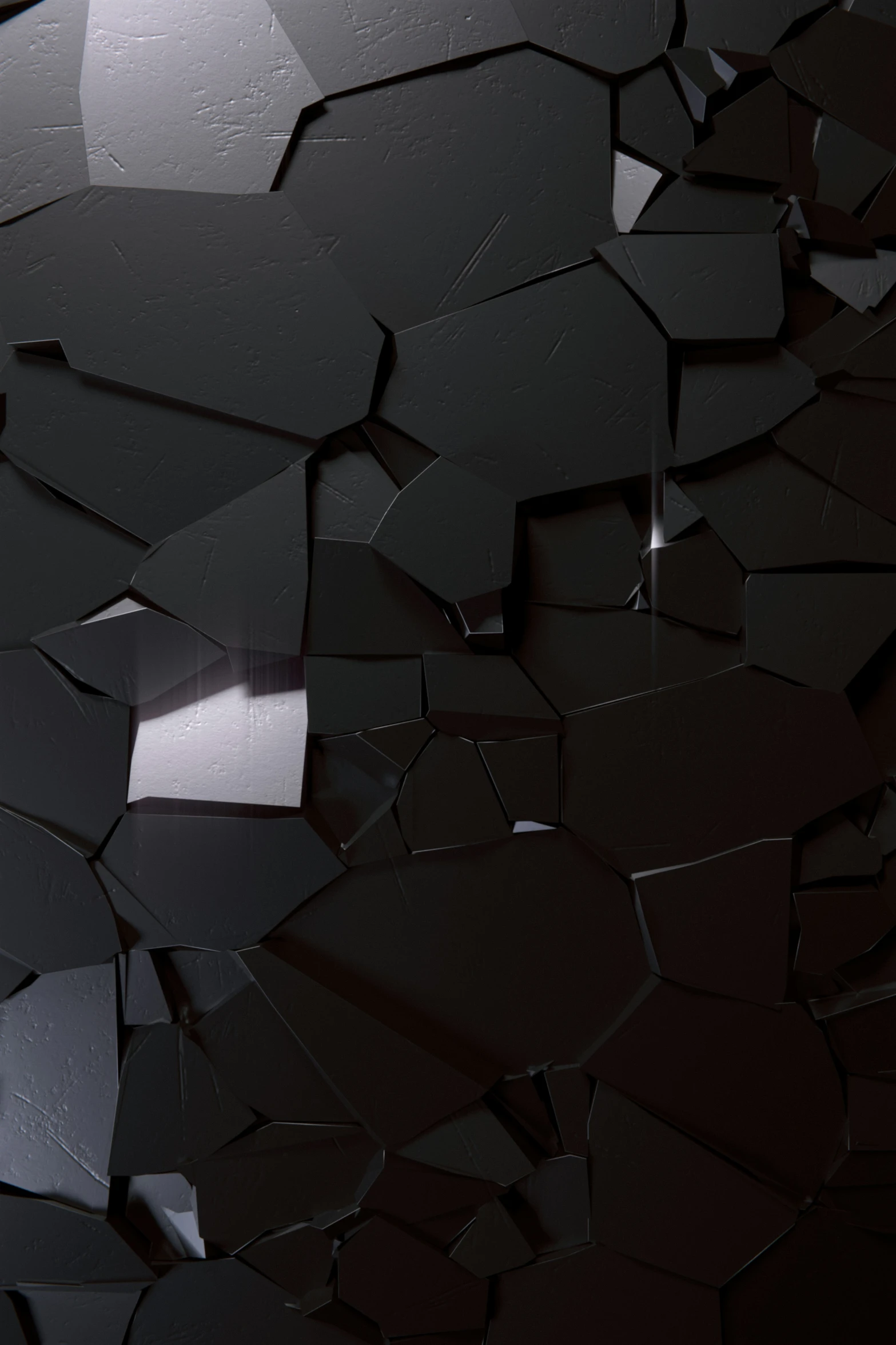 some black shards on a wall with the light shining in them