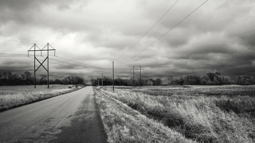 some power lines sitting on the side of a road