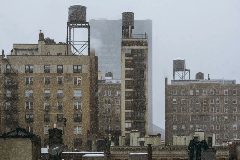 a couple of buildings on a cloudy day