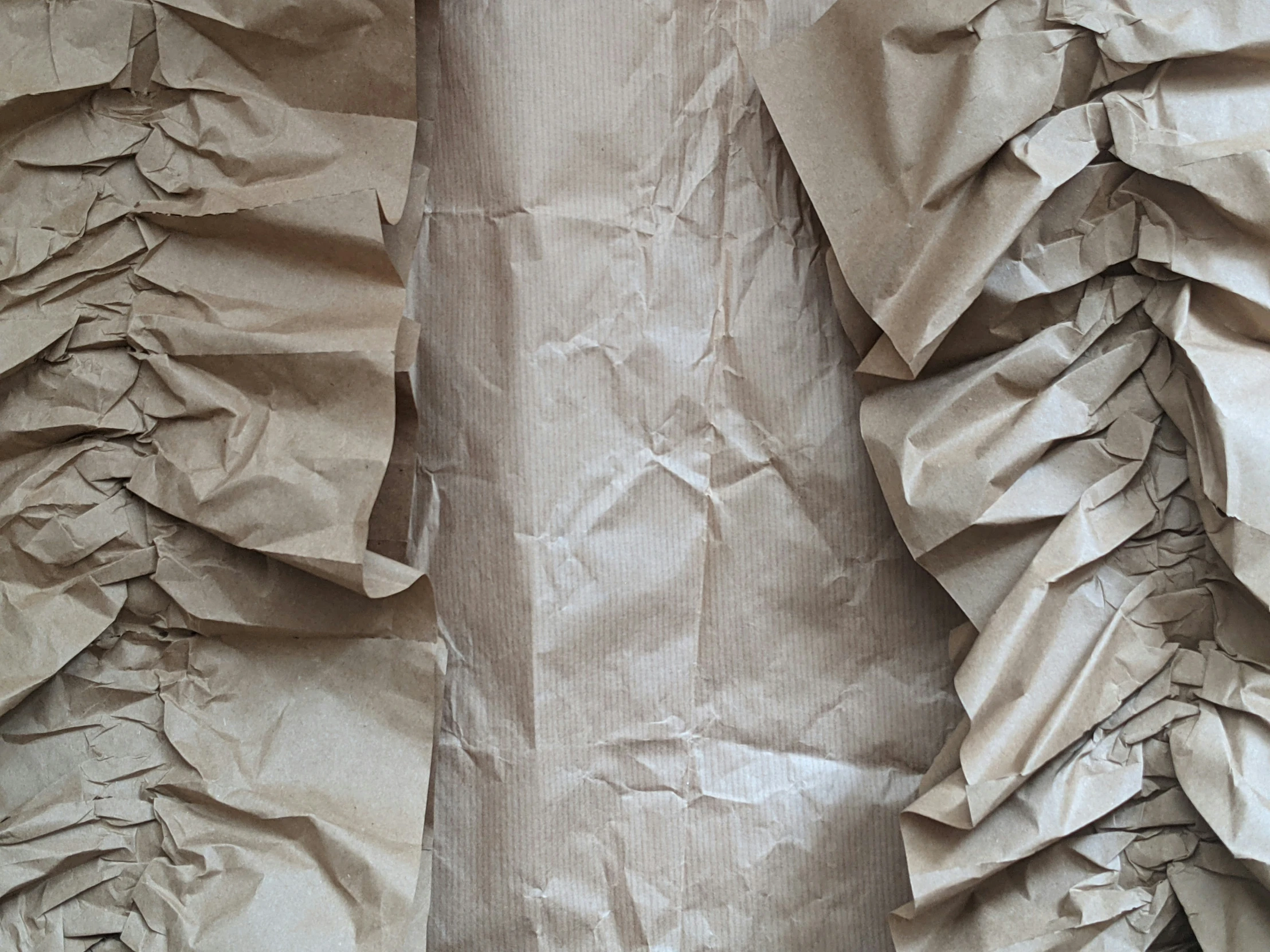 the clothing is covered in many layers of paper