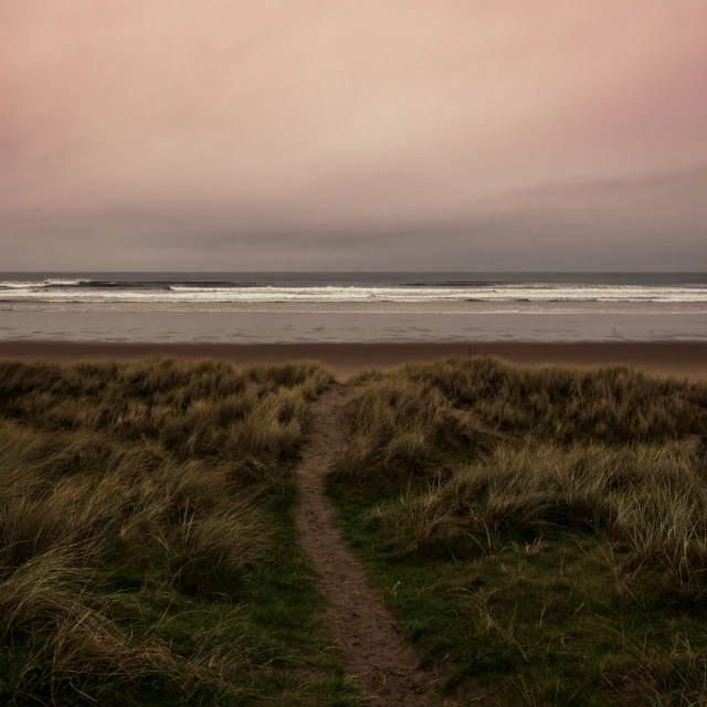 a view of some water on a cloudy day