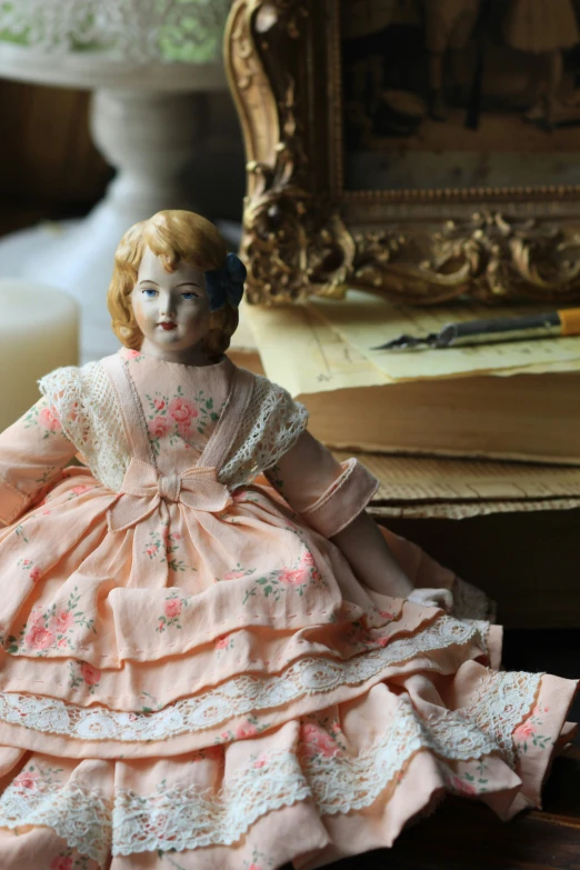 an image of a doll dressed in an elegant dress