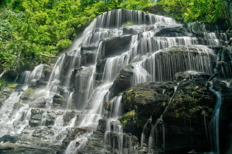 this is a large water fall in the woods