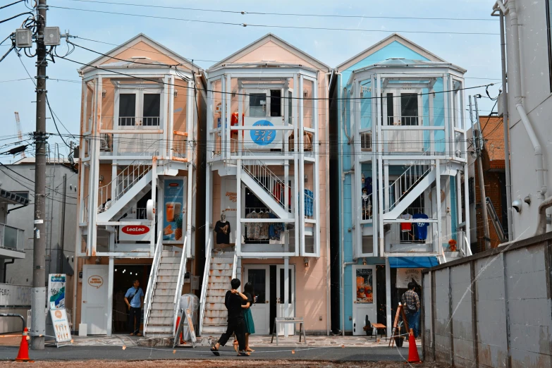 some tall wooden buildings near one another