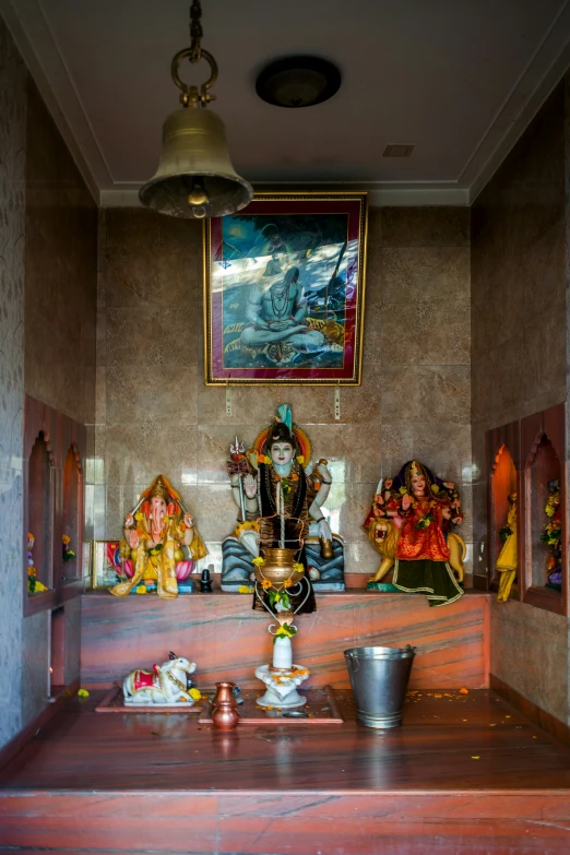 this is a small shrine in a buddhist temple