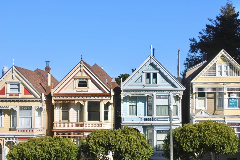 a street view of many houses on the street