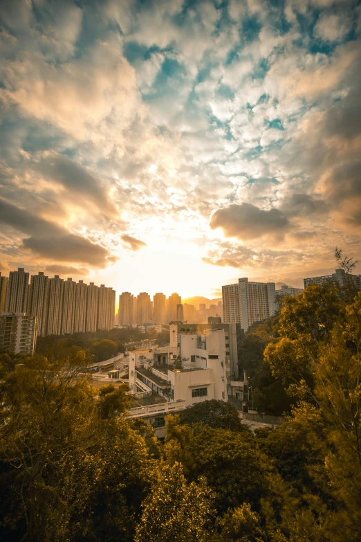 view of a skyline during the day with a sunset