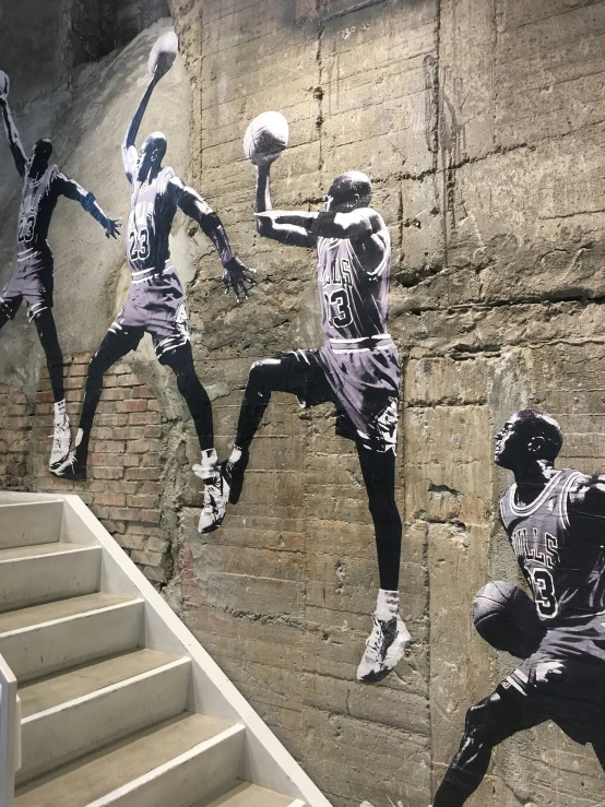 an image of a mural of three soccer players