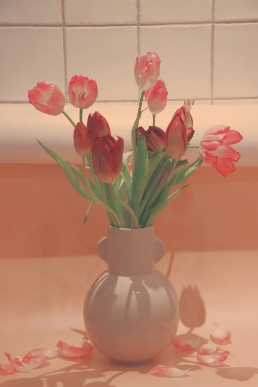 flowers in a vase sitting on a table