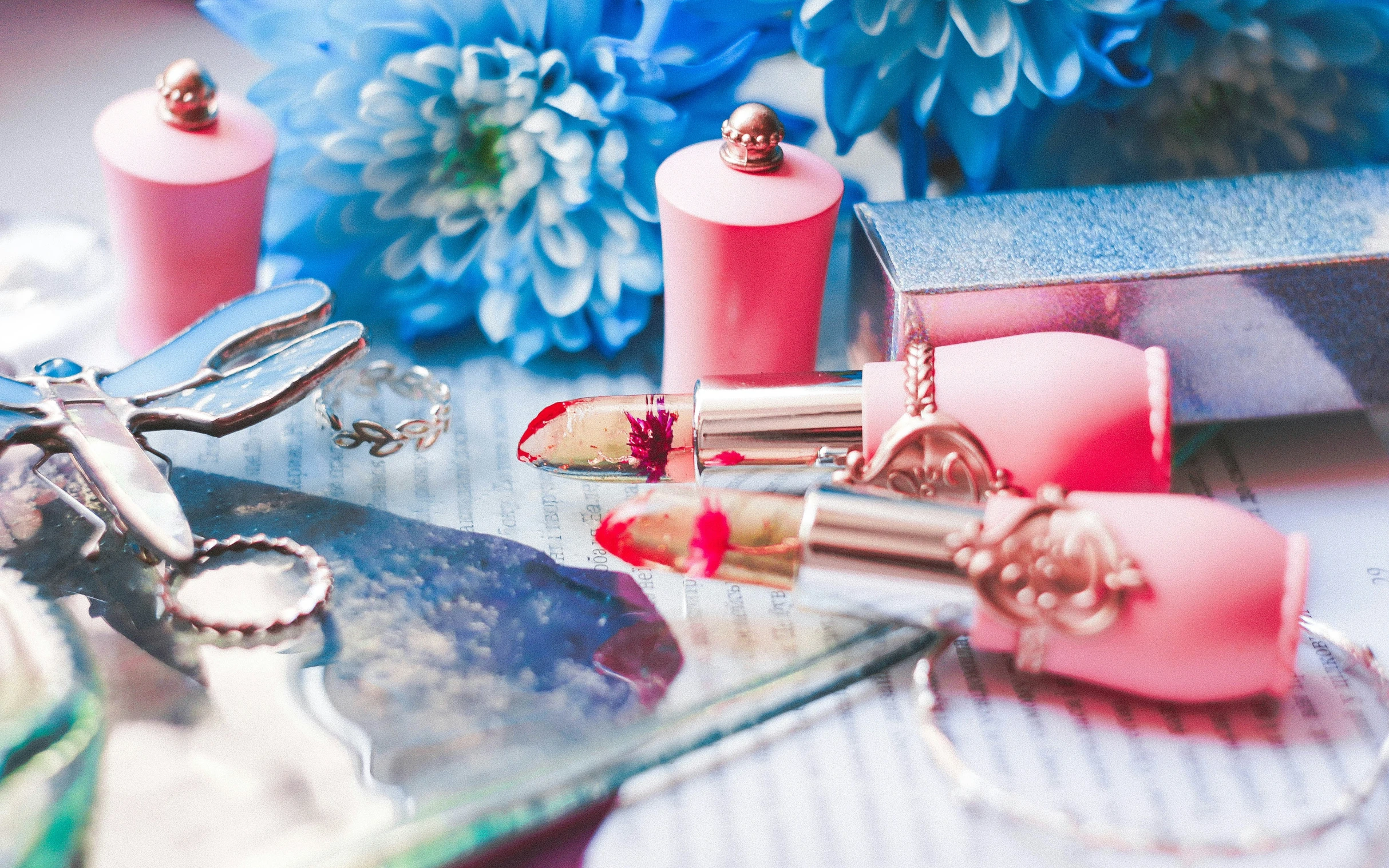 the beauty products on the table have been used for makeup