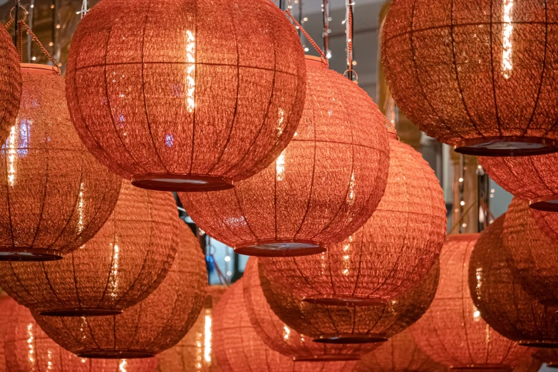 many orange and red round shaped lanterns