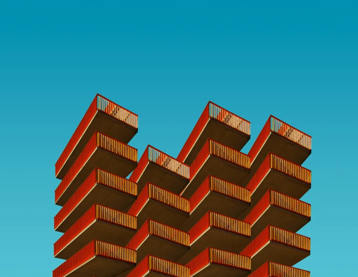 a tower with lots of red building sections