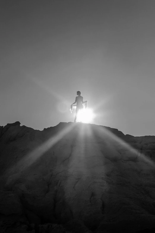 a person riding a bicycle down a hill