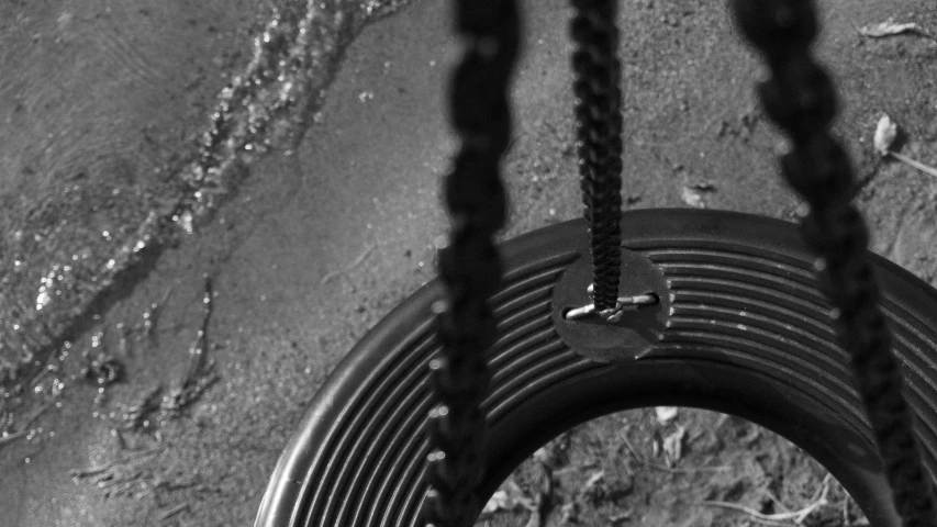 a closeup of a tire chains on a tire