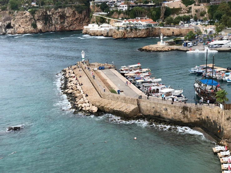 an aerial view of boats docked at the port