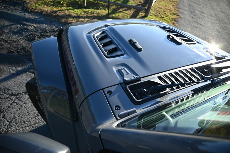 an image of a car's hood that is parked