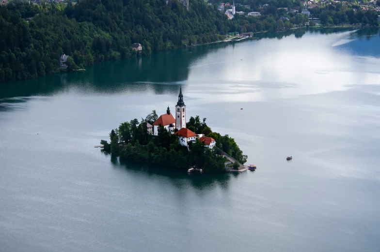 small island that has an island with trees on it