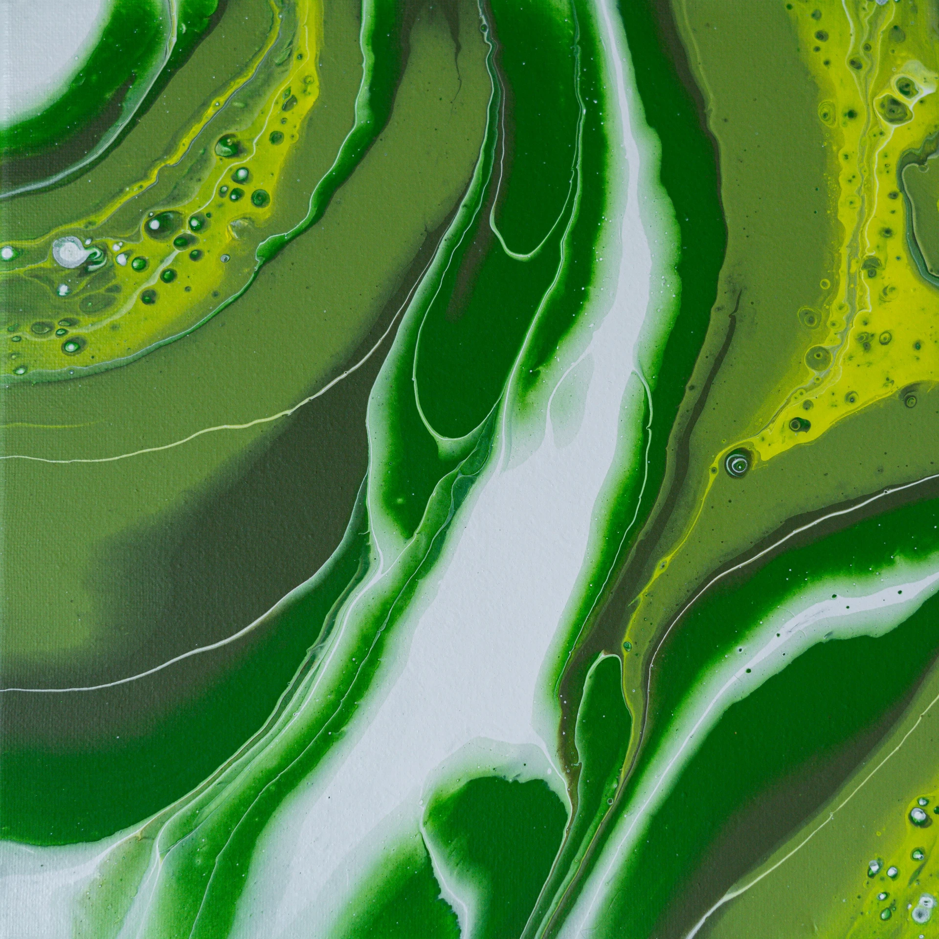 a green and white landscape with a wavy curve