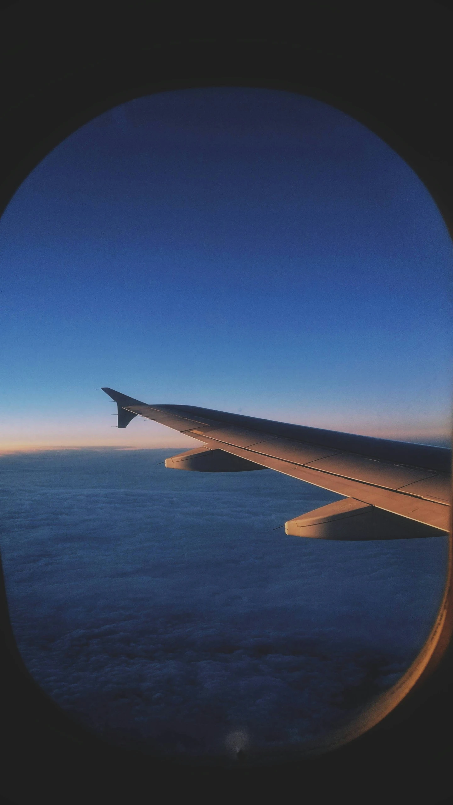 a view of the wing from an airplane