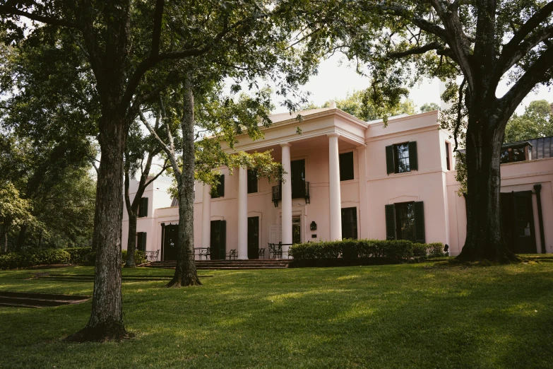 the beautiful exterior of an older - looking home