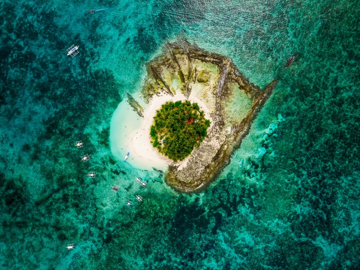 an aerial view of an island in the ocean