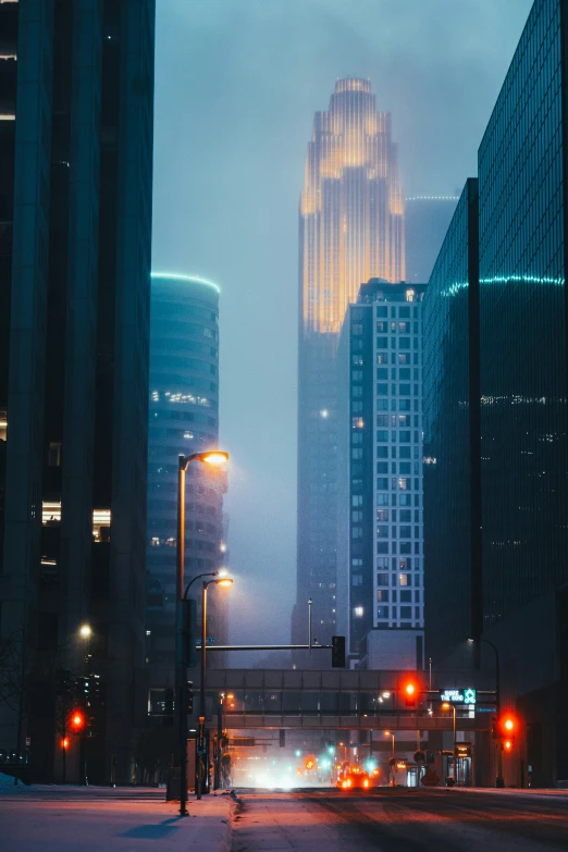 city skyline with a very tall building in the background