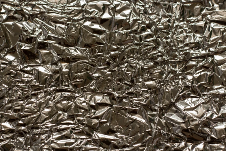 the texture of silver paper is being shown